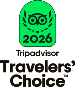 Tripadvisor Travelers' Choice 2026 logo with green owl icon.