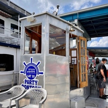 a chair sitting in front of a building