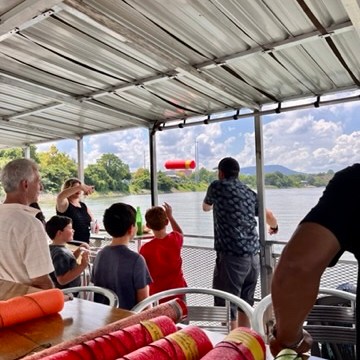 a group of people sitting at a table